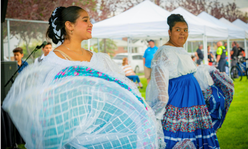 Two young women dancing Ballet de Folklorico